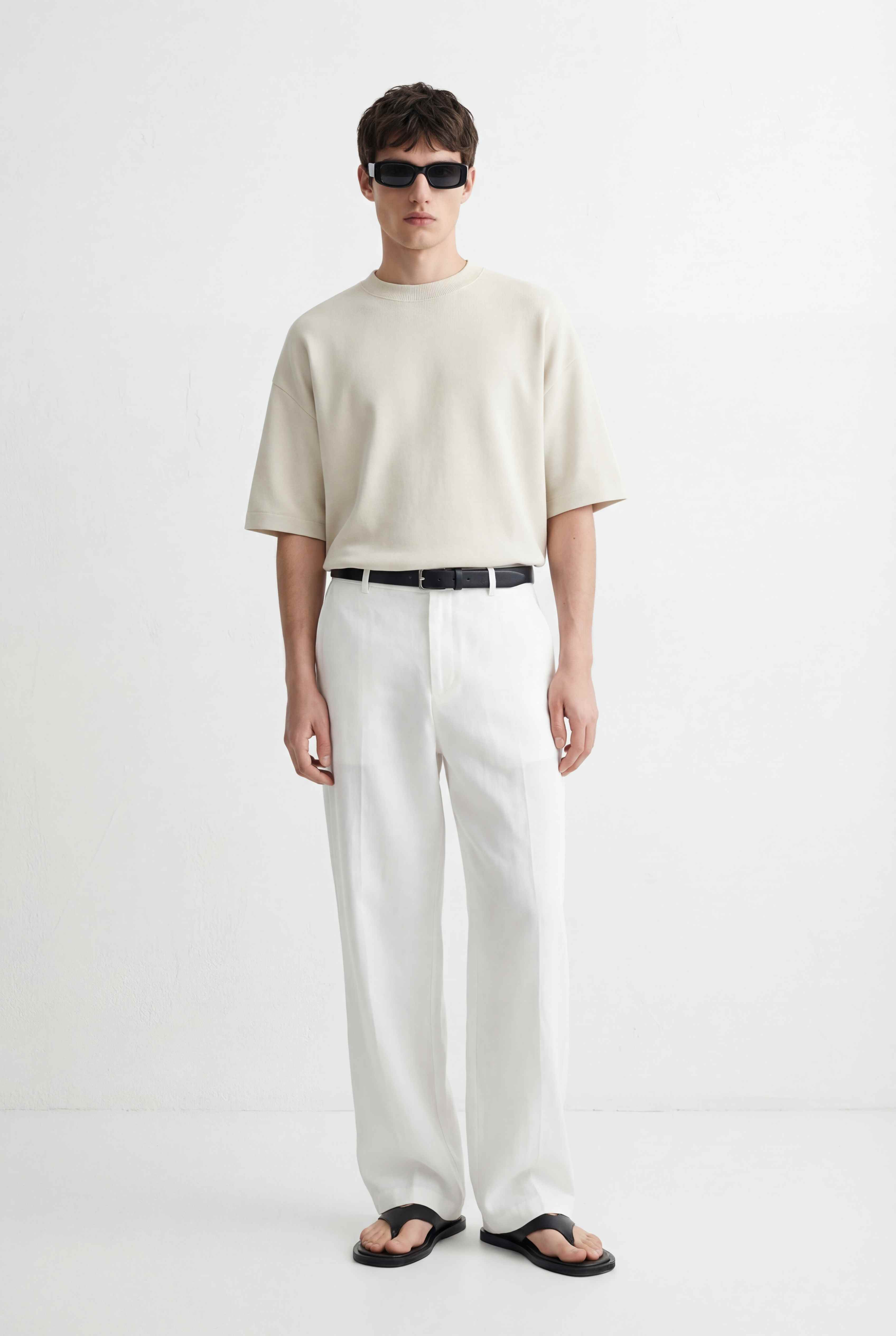 Minimalist menswear - cream tones with sunglasses